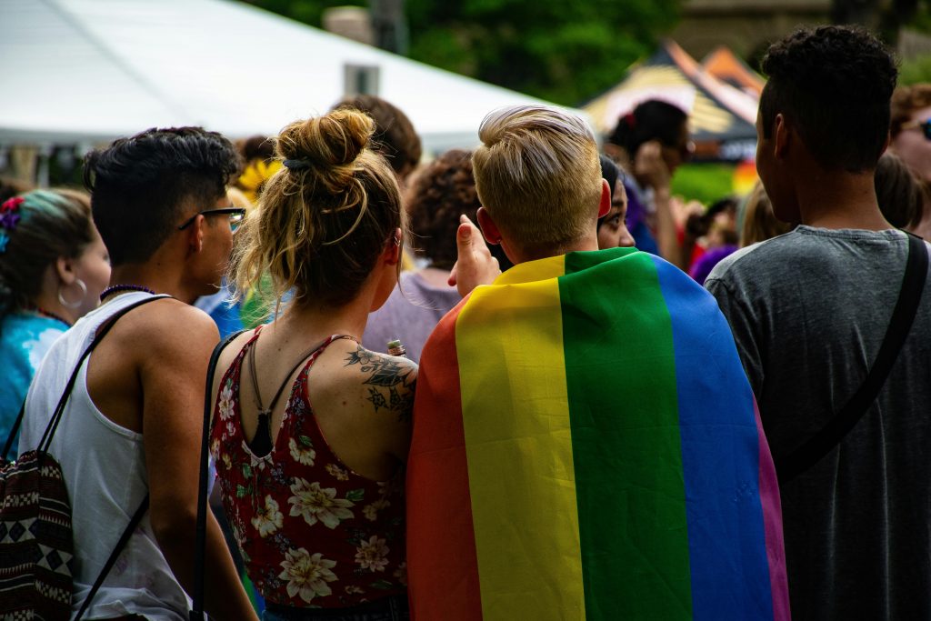 pexels-photo-1167034-1167034 A festive crowd celebrating LGBTQ pride with vibrant rainbow colors and lively atmosphere.
